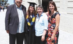 Jenna Newton at her convocation with her mother and grandparents.