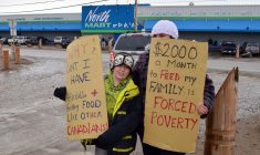 Protesters draw attention to high food prices in the North on Saturday June 9, 2012 in Iqualuit, Nunavut. THE CANADIAN PRESS/Aaron Watson